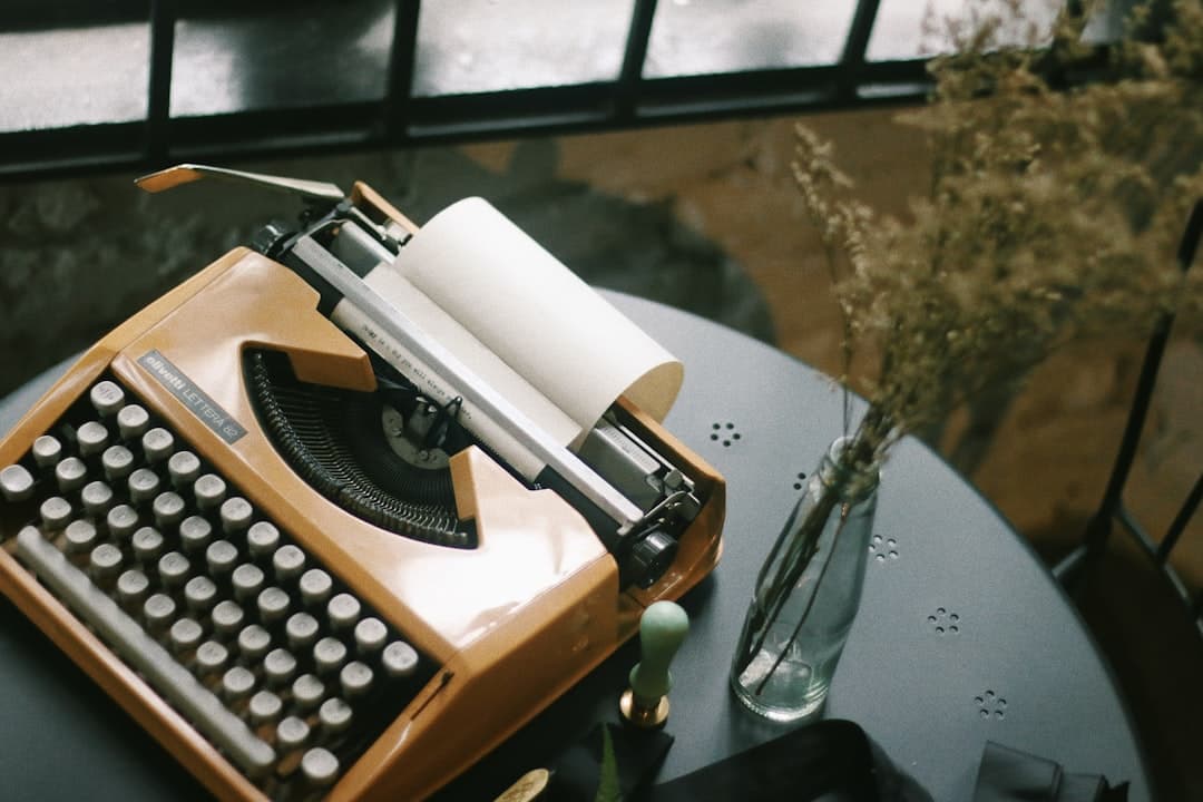 Portrait of the author at a writing desk